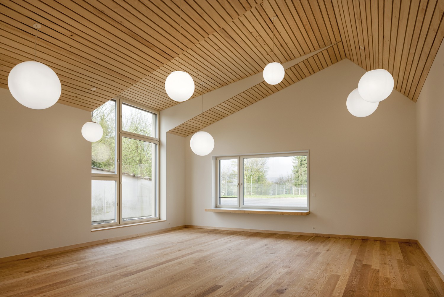 HUMMBURKART ARCHITEKTEN: Erweiterung Schulhaus mit Doppelkindergarten in Sisseln